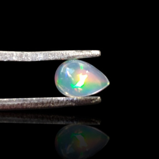 Opal z Etiopii kaboszon 6x4 mm nr 782