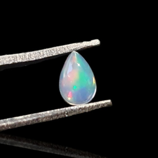 Opal z Etiopii kaboszon 6x4 mm nr 782