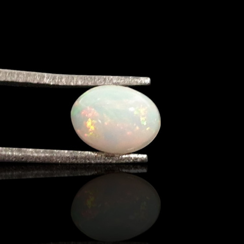 Opal z Etiopii kaboszon 8x6 mm nr 740