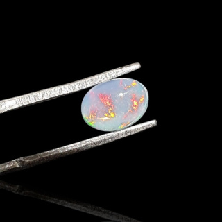 Opal z Etiopii kaboszon 8x6 mm nr 756