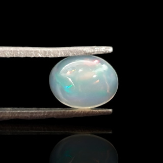 Opal z Etiopii kaboszon 9x7 mm nr 717