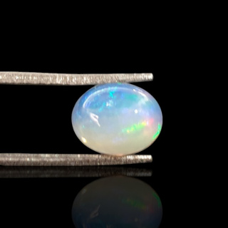 Opal z Etiopii kaboszon 9x7 mm nr 720