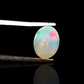 Opal z Etiopii kaboszon 9x7 mm nr 722