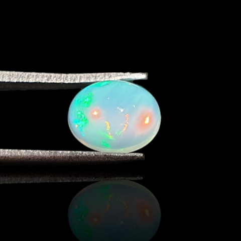 Opal z Etiopii kaboszon 9x7 mm nr 725