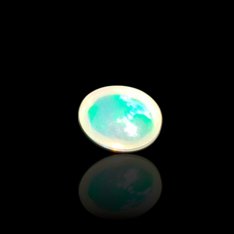 Opal z Etiopii kaboszon 9x7 mm nr 725