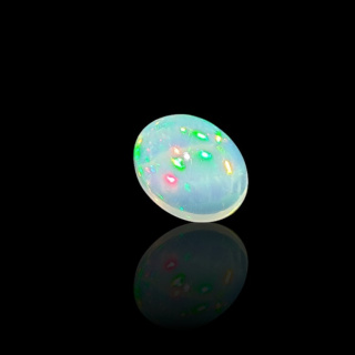 Opal z Etiopii kaboszon 9x7 mm nr 727