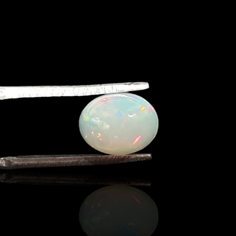 Opal z Etiopii kaboszon 9x7 mm nr 729