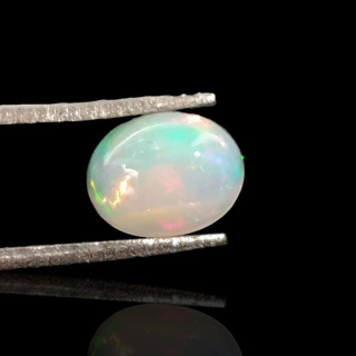 Opal z Etiopii kaboszon 9x7 mm nr 731