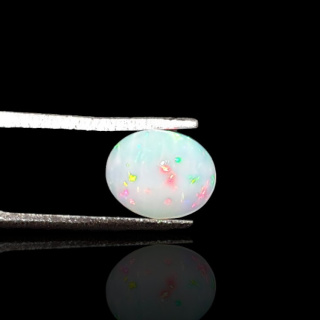 Opal z Etiopii kaboszon 9x7 mm nr 733