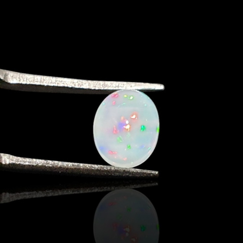 Opal z Etiopii kaboszon 9x7 mm nr 733