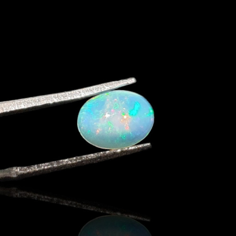 Opal z Etiopii kaboszon 9x7 mm nr 736