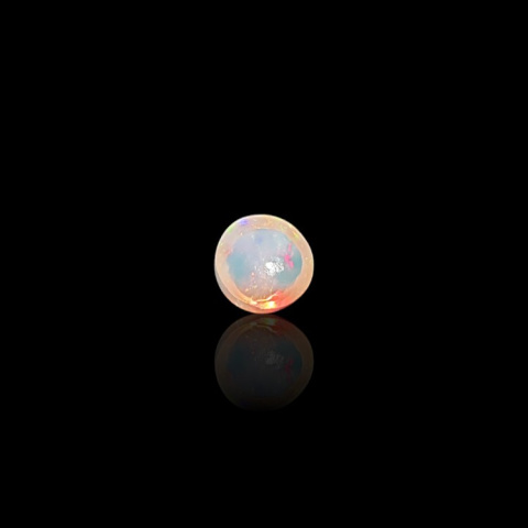 Opal z Etiopii kaboszon fi 7 mm nr 791