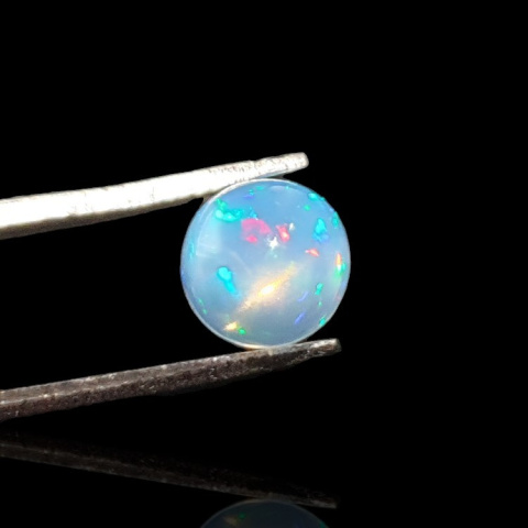 Opal z Etiopii kaboszon fi 7 mm nr 793