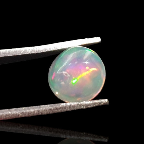 Opal z Etiopii kaboszon fi 7 mm nr 794