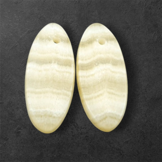 Żółty aragonit para kaboszonów z dziurką 24x11 mm nr P963
