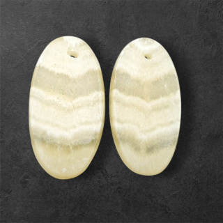 Żółty aragonit para kaboszonów z dziurką 24x13 mm nr P949