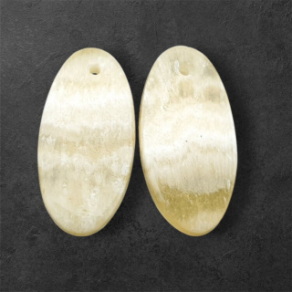 Żółty aragonit para kaboszonów z dziurką 25x13 mm nr P954