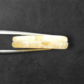 Żółty aragonit para kaboszonów z dziurką 26x11 mm nr P950