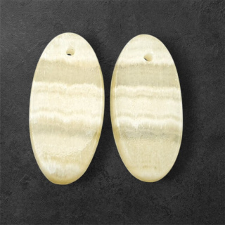 Żółty aragonit para kaboszonów z dziurką 26x13 mm nr P965