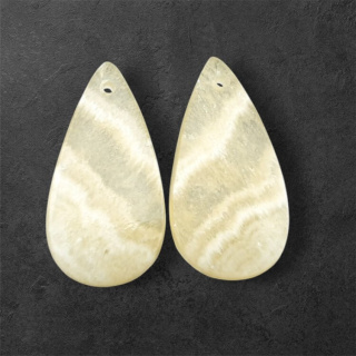 Żółty aragonit para kaboszonów z dziurką 26x13 mm nr P967