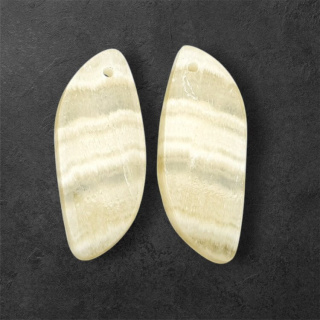 Żółty aragonit para kaboszonów z dziurką 27x11 mm nr P958