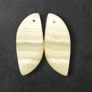 Żółty aragonit para kaboszonów z dziurką 28x12 mm nr P946