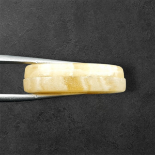Żółty aragonit para kaboszonów z dziurką 28x14 mm nr P955