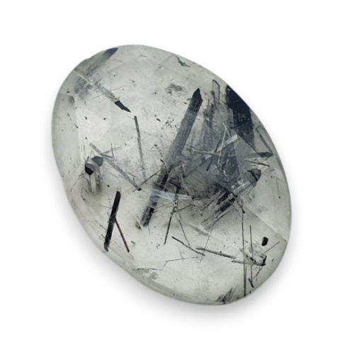Kwarc z turmalinem kaboszon fasetowany 23x17 mm nr 24 Kwarc z turmalinem kaboszon fasetowany 23x17 mm nr 24