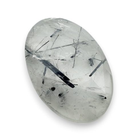 Kwarc z turmalinem kaboszon fasetowany 28x19 mm nr 21 Kwarc z turmalinem kaboszon fasetowany 28x19 mm nr 21
