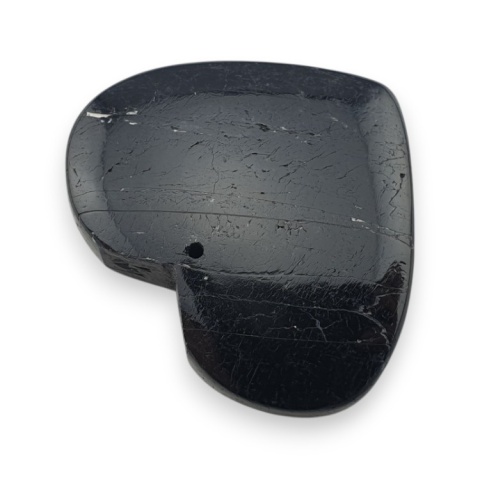 Black tourmaline heart with mounting hole 37x31 mm no 4 Black tourmaline heart with mounting hole 37x31 mm no 4