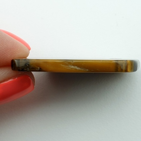Tiger's eye slice with mounting hole 42x29 mm no 47 Tiger's eye slice with mounting hole 42x29 mm no 47