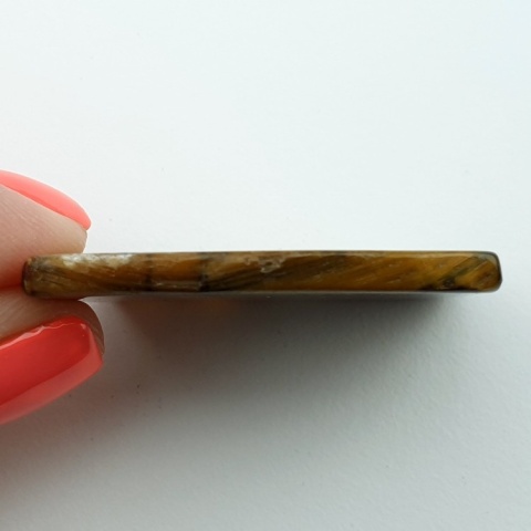 Tiger's eye slice with mounting hole 47x32 mm no 36 Tiger's eye slice with mounting hole 47x32 mm no 36