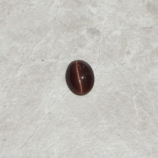 Skapolit kocie oko kaboszon 10x7 mm nr 182