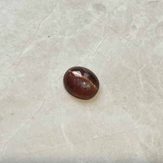 Skapolit kocie oko kaboszon 10x8 mm nr 126