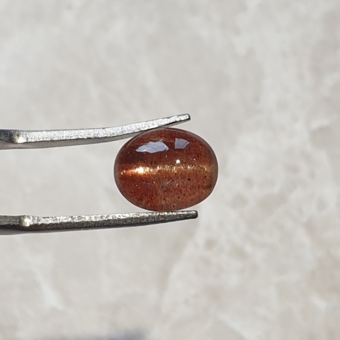 Scapolite cat's eye cabochon 10x8 mm no 126