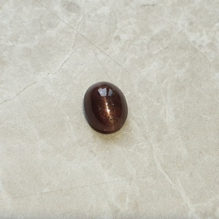Skapolit kocie oko kaboszon 10x8 mm nr 131