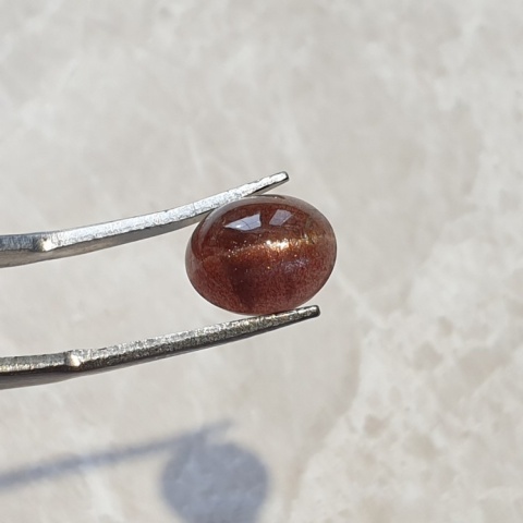 Scapolite cat's eye cabochon 10x8 mm no 131