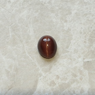 Skapolit kocie oko kaboszon 10x8 mm nr 166