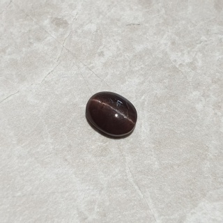 Skapolit kocie oko kaboszon 10x8 mm nr 174