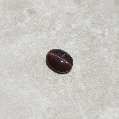 Skapolit kocie oko kaboszon 10x8 mm nr 174