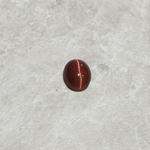 Scapolite cat's eye cabochon 10x8 mm no 189