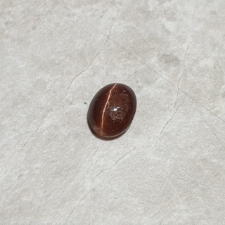 Skapolit kocie oko kaboszon 10x8 mm nr 190