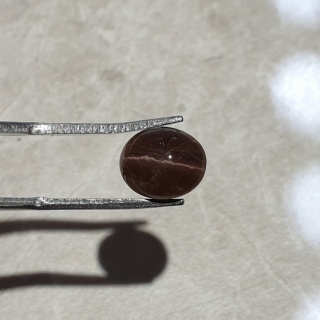 Skapolit kocie oko kaboszon 10x8 mm nr 228