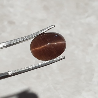 Skapolit kocie oko kaboszon 10x8 mm nr 232