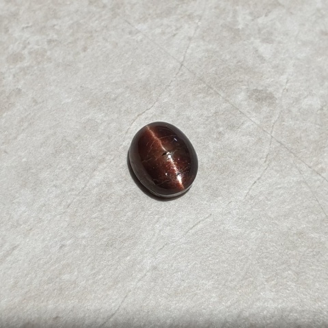 Scapolite cat's eye cabochon 10x8 mm no 258