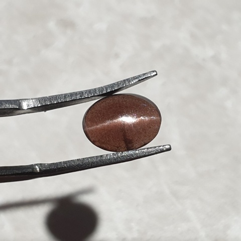 Skapolit kocie oko kaboszon 10x8 mm nr 276