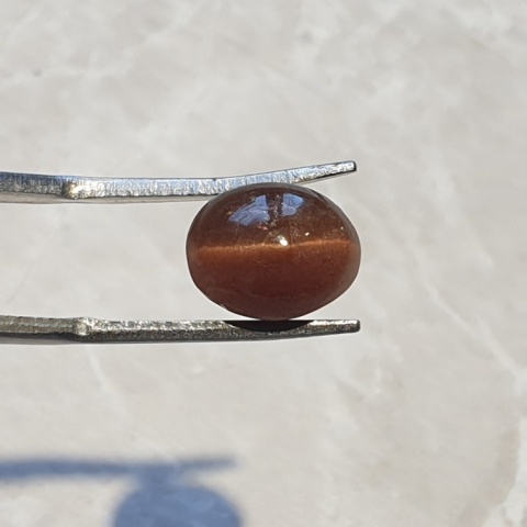 Skapolit kocie oko kaboszon 10x8 mm nr 65