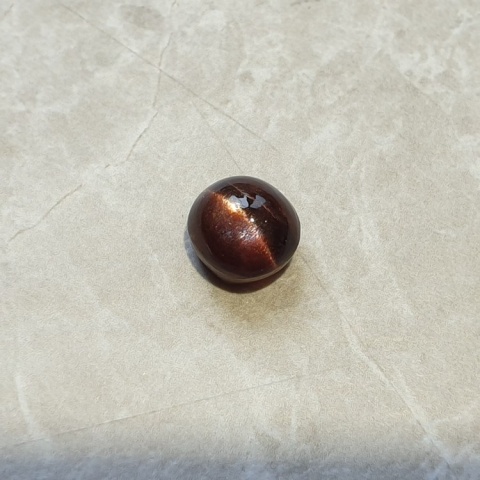 Skapolit kocie oko kaboszon 10x9 mm nr 129