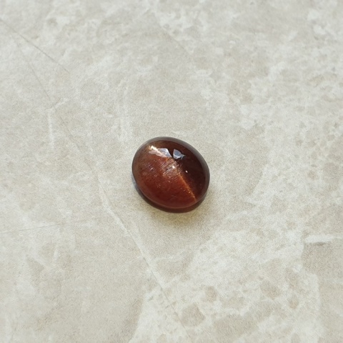Scapolite cat's eye cabochon 10x9 mm no 156