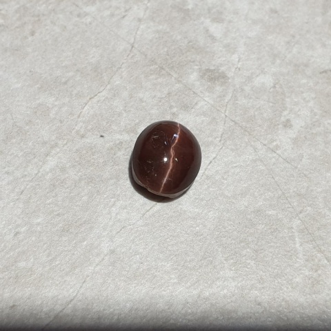 Scapolite cat's eye cabochon 10x9 mm no 199